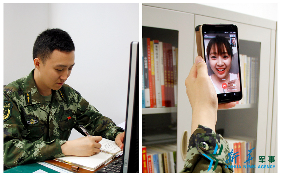 &uarr;陳德正，武警北京總隊(duì)七支隊(duì)某中隊(duì)指導(dǎo)員。七夕前夜堅(jiān)守在值班崗位上的他，在結(jié)束值班后給妻子打了個(gè)視頻電話，通過(guò)網(wǎng)絡(luò)表達(dá)著對(duì)妻子的愛(ài)意。閆星辰 攝