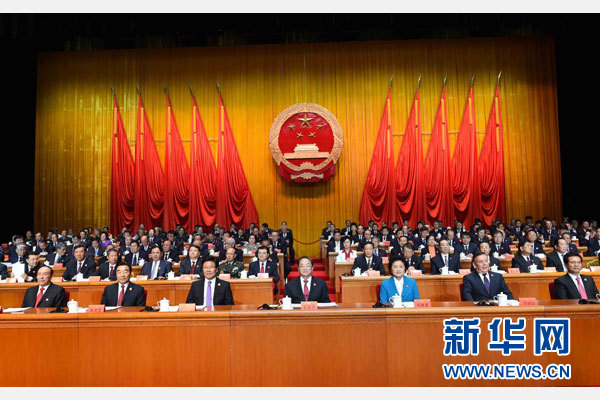 10月1日，慶祝中華人民共和國成立66周年暨新疆維吾爾自治區(qū)成立60周年大會(huì)在新疆人民會(huì)堂隆重舉行。 新華社記者 饒愛民 攝