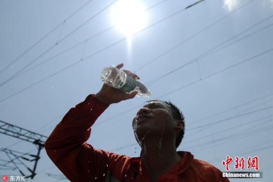 資料圖：高溫下的人。胡國林 攝 圖片來源：東方IC 版權作品 請勿轉載