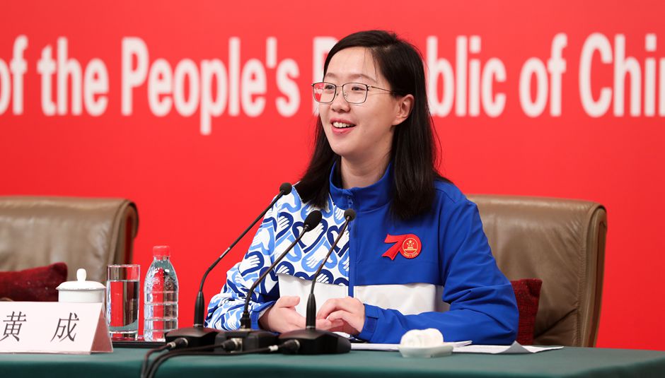 志愿者代表、清華大學經(jīng)濟管理學院四年級博士生黃成介紹相關情況