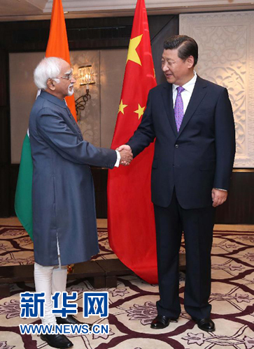 9月18日，國家主席習(xí)近平在新德里會見印度副總統(tǒng)兼聯(lián)邦院議長安薩里。 新華社記者 龐興雷 攝