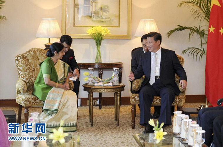 9月18日，國家主席習(xí)近平在新德里會見印度外長斯瓦拉杰。新華社記者 張鐸 攝