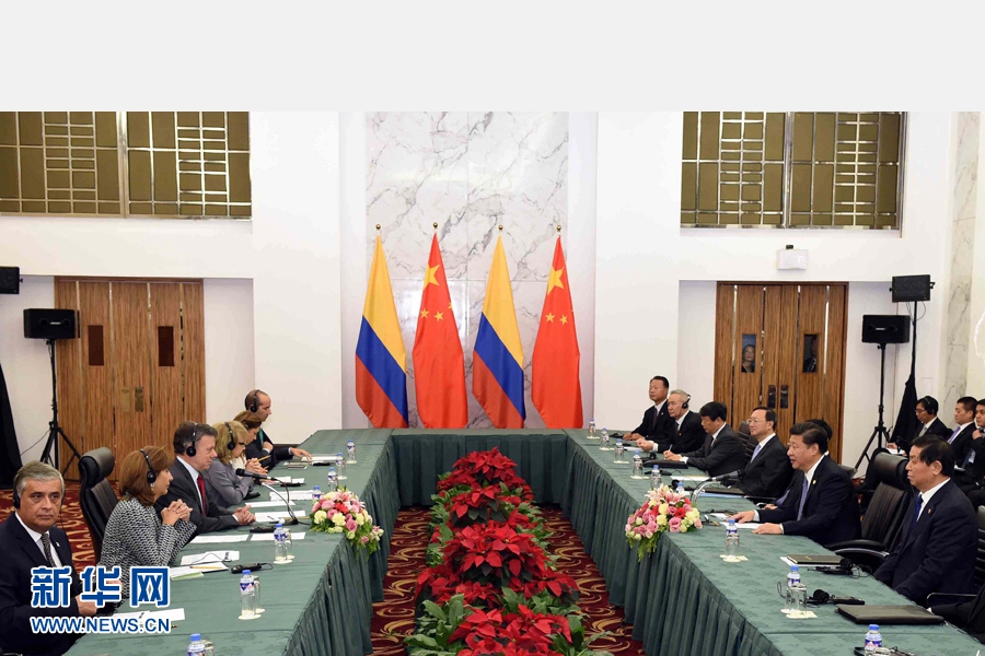 11月18日，國家主席習近平在菲律賓馬尼拉會見哥倫比亞總統(tǒng)桑托斯。 新華社記者 饒愛民 攝