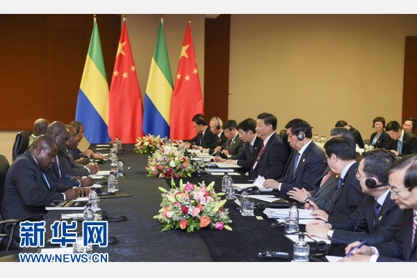 12月3日，國(guó)家主席習(xí)近平在約翰內(nèi)斯堡會(huì)見加蓬總統(tǒng)邦戈。新華社記者 謝環(huán)馳 攝 