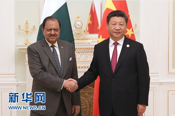 6月23日，國家主席習近平在塔什干會見巴基斯坦總統(tǒng)侯賽因。新華社記者馬占成攝