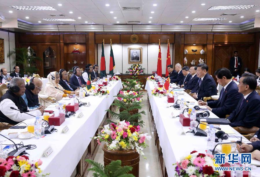 10月14日，國家主席習近平在達卡同孟加拉國總理哈西娜舉行會談。 新華社記者劉衛(wèi)兵攝 