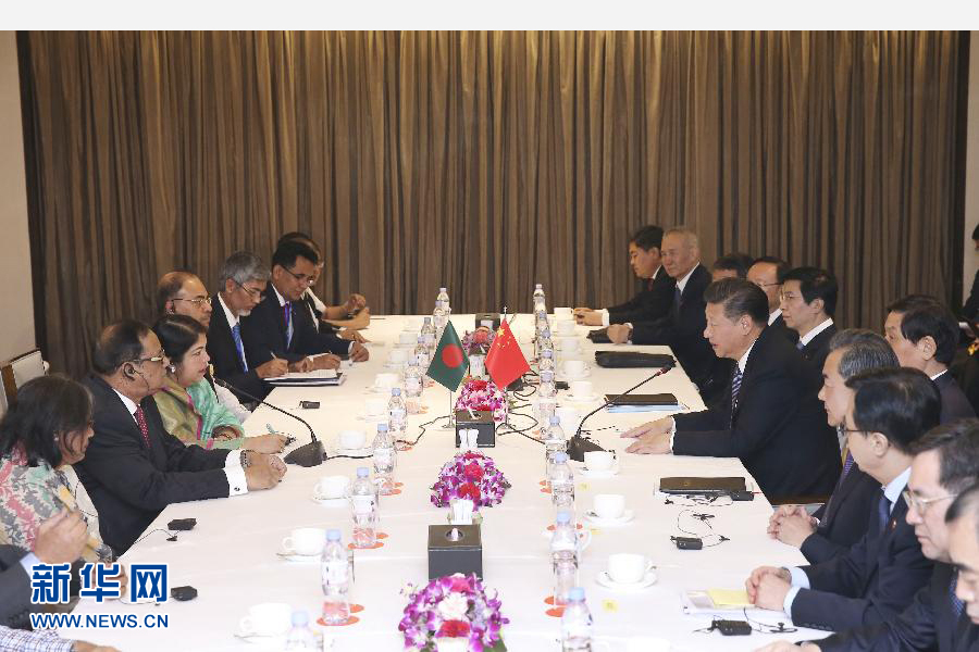 10月14日，國家主席習(xí)近平在達(dá)卡會見孟加拉國國民議會議長喬杜里。 新華社記者龐興雷攝 